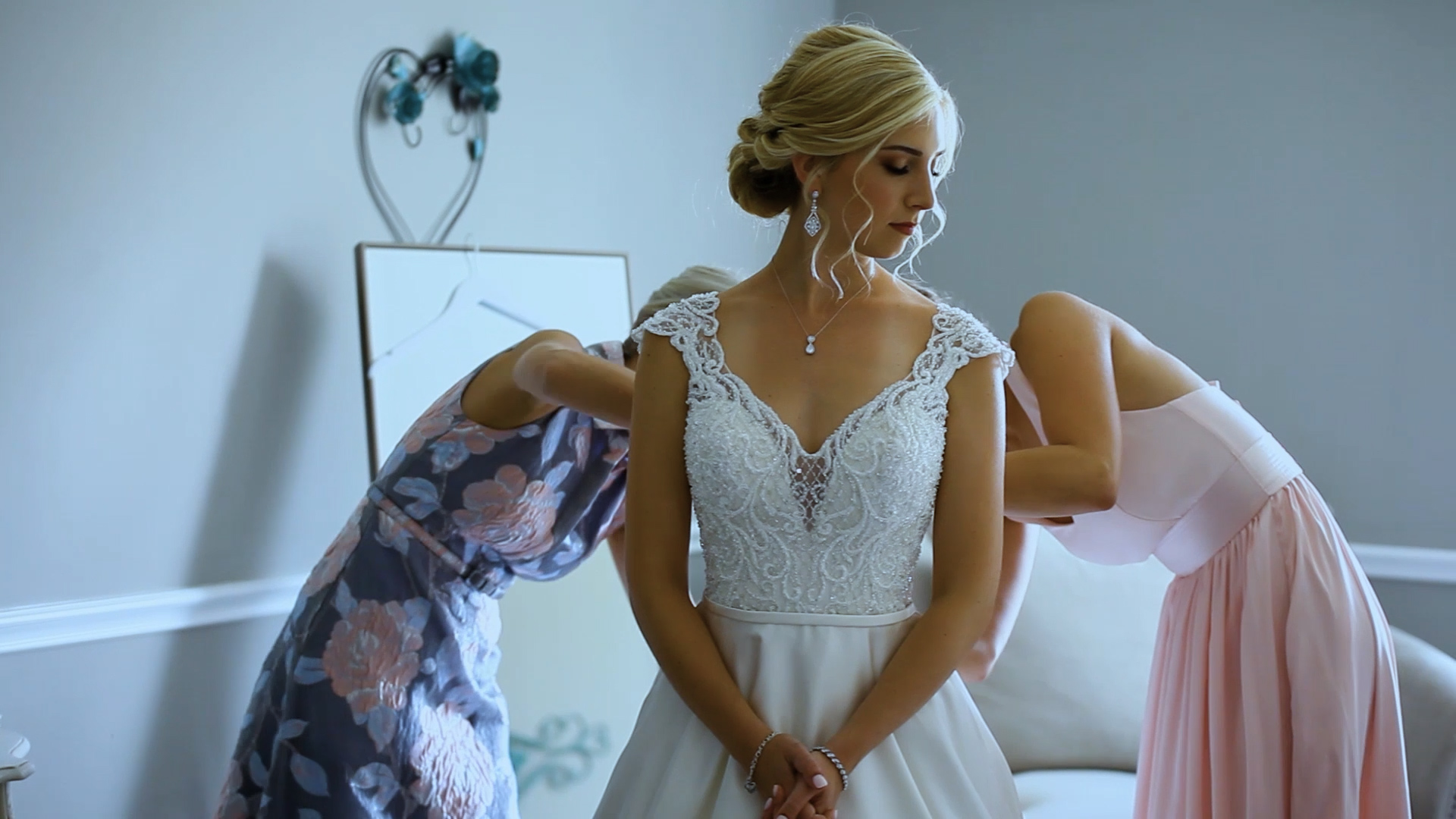 bride-putting-on-dress-not-white-balanced